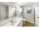 Bright bathroom with a large mirror and a shower/tub combo at 126 S Mustin Dr, Anderson, IN 46012