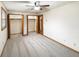 Bedroom with a ceiling fan and ample closet space at 126 S Mustin Dr, Anderson, IN 46012