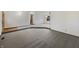 Spacious living room with carpet and white walls, ready for personalization at 126 S Mustin Dr, Anderson, IN 46012