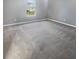 Clean and simple bedroom featuring soft carpet, neutral paint and one large window at 12840 Patrick Ct, Fishers, IN 46038
