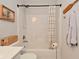 Well-maintained bathroom featuring a shower-tub combination, neutral decor, and coordinated accessories at 1307 Peregrine Ln, Greenwood, IN 46143