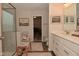Bathroom with double vanity, shower with glass door and a view to the toilet and a baby crib at 1307 Peregrine Ln, Greenwood, IN 46143