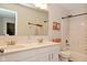 Clean bathroom with double sink vanity, a shower and tub combination with paddle-themed decor at 1307 Peregrine Ln, Greenwood, IN 46143