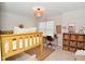 Inviting ' bedroom featuring a desk, bunk bed, and neutral decor at 1307 Peregrine Ln, Greenwood, IN 46143