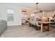 Open concept living featuring dining area and living room with lots of natural light at 1307 Peregrine Ln, Greenwood, IN 46143