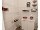 Organized pantry with wire shelving and storage cabinets for ample kitchen storage at 1307 Peregrine Ln, Greenwood, IN 46143