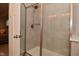 Modern bathroom shower with glass enclosure and tiled walls at 1307 Peregrine Ln, Greenwood, IN 46143