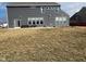 Back of house featuring a large backyard and outdoor space at 1347 Preserve Ct, Greenwood, IN 46143