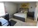 Cozy bedroom with a Lakers banner, a comfortable bed, and a neutral color scheme at 1347 Preserve Ct, Greenwood, IN 46143