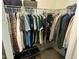 Organized walk-in closet with ample hanging space and shelving for clothes and accessories at 1347 Preserve Ct, Greenwood, IN 46143