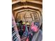 Interior of outdoor shed containing ladders, shop lights, and other miscellaneous items at 1437 E Pleasant Run Pkwy S Dr, Indianapolis, IN 46203