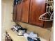 Storage area with upper cabinets and counterspace for storage of household items at 1437 E Pleasant Run Pkwy S Dr, Indianapolis, IN 46203