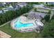 Aerial view of a neighborhood pool showcasing the amenities, including a leisure pool, and kiddie pool at 14904 Tiago Ln, Fishers, IN 46040