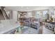 Inviting living space with open kitchen, island seating, and comfortable furnishings throughout at 14904 Tiago Ln, Fishers, IN 46040