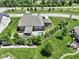 Beautiful home with backyard pool, putting green, and lush, mature landscaping at 15694 Provincial Ln, Fishers, IN 46040