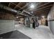 Spacious unfinished basement with exposed ceiling, concrete foundation, and installed HVAC at 15694 Provincial Ln, Fishers, IN 46040