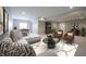 Spacious basement with a cozy entertainment area, plush seating, and stylish decor creates a relaxing atmosphere at 15694 Provincial Ln, Fishers, IN 46040