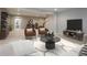 Finished basement features entertainment area, neutral colors, and stylish furniture for a versatile living space at 15694 Provincial Ln, Fishers, IN 46040