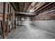 An unfinished basement with concrete floor and walls, and visible ceiling framework at 15694 Provincial Ln, Fishers, IN 46040