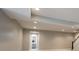 A bright unfinished basement offers recessed lighting, neutral walls and carpet and a plumbed bathroom at 15694 Provincial Ln, Fishers, IN 46040