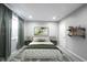 Well-lit bedroom features neutral decor, stylish furnishings, and soft textures for a comfortable retreat at 15694 Provincial Ln, Fishers, IN 46040