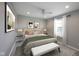 Comfortable bedroom boasts neutral decor, soft lighting, and stylish furnishings for a peaceful retreat at 15694 Provincial Ln, Fishers, IN 46040