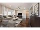 Spacious living room with plush seating, modern decor, and plenty of natural light at 15694 Provincial Ln, Fishers, IN 46040