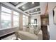 Bright living room connected to dining area, featuring stylish decor and large windows at 15694 Provincial Ln, Fishers, IN 46040