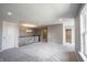 Loft featuring neutral carpet, modern lighting, and black and white stair railing at 15694 Provincial Ln, Fishers, IN 46040
