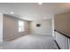 Upstairs loft space featuring a window and a mount for a television at 15694 Provincial Ln, Fishers, IN 46040