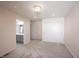 A spacious main bedroom features neutral walls, plush carpeting, and a walk-in closet with a connected bathroom at 15694 Provincial Ln, Fishers, IN 46040