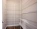 Walk-in pantry with multiple shelves, providing ample storage at 15694 Provincial Ln, Fishers, IN 46040