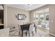Dining area featuring modern chandelier and lots of bright light at 1692 S Centennial Ave, New Palestine, IN 46163