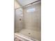 Modern walk-in shower featuring glass doors and tiled walls at 1692 S Centennial Ave, New Palestine, IN 46163