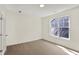 Bright bedroom with carpet and a large window, offering plenty of natural light at 19714 Highclere Ln, Sheridan, IN 46069