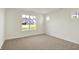 Bright bedroom with large windows offering natural light and neutral carpeting at 19714 Highclere Ln, Sheridan, IN 46069
