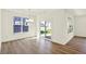 Bright dining area with wood floors, chandelier lighting and large windows at 19714 Highclere Ln, Sheridan, IN 46069