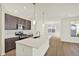 Open concept kitchen with stainless appliances, island and modern finishes at 19714 Highclere Ln, Sheridan, IN 46069
