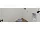 Laundry room with utility hookups, fresh paint, and gray flooring at 19714 Highclere Ln, Sheridan, IN 46069