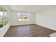 Bright living room with large windows and hardwood floors at 19714 Highclere Ln, Sheridan, IN 46069