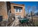 Relaxing outdoor space with brick exterior, patio area, small garden, and potential for gatherings at 198 E Madison St, Franklin, IN 46131
