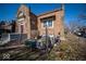 Outdoor patio area featuring brick exterior, cozy seating, with a small garden and inviting atmosphere at 198 E Madison St, Franklin, IN 46131