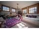 Cozy bedroom with natural light, wood trim windows, and comfortable beds at 198 E Madison St, Franklin, IN 46131