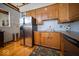 Kitchen featuring stainless steel refrigerator, granite countertops and hardwood floors at 198 E Madison St, Franklin, IN 46131