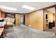 Spacious basement with wood paneling, neutral carpet, and ample room for storage and recreation at 2002 Fisher Ave, Indianapolis, IN 46224