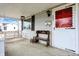 Inviting covered front porch with bench and swing at 2002 Fisher Ave, Indianapolis, IN 46224