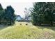 This home has a spacious backyard with mature trees and partial fencing at 226 Sandbrook Cir, Noblesville, IN 46062