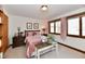 Traditional bedroom with a bed, carpet flooring, and a dresser at 226 Sandbrook Cir, Noblesville, IN 46062