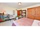Bedroom with a book shelf, wood floors, and a full closet at 226 Sandbrook Cir, Noblesville, IN 46062