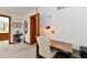 Home office featuring a desk, chair, built-in bookshelves, and wood trim at 226 Sandbrook Cir, Noblesville, IN 46062